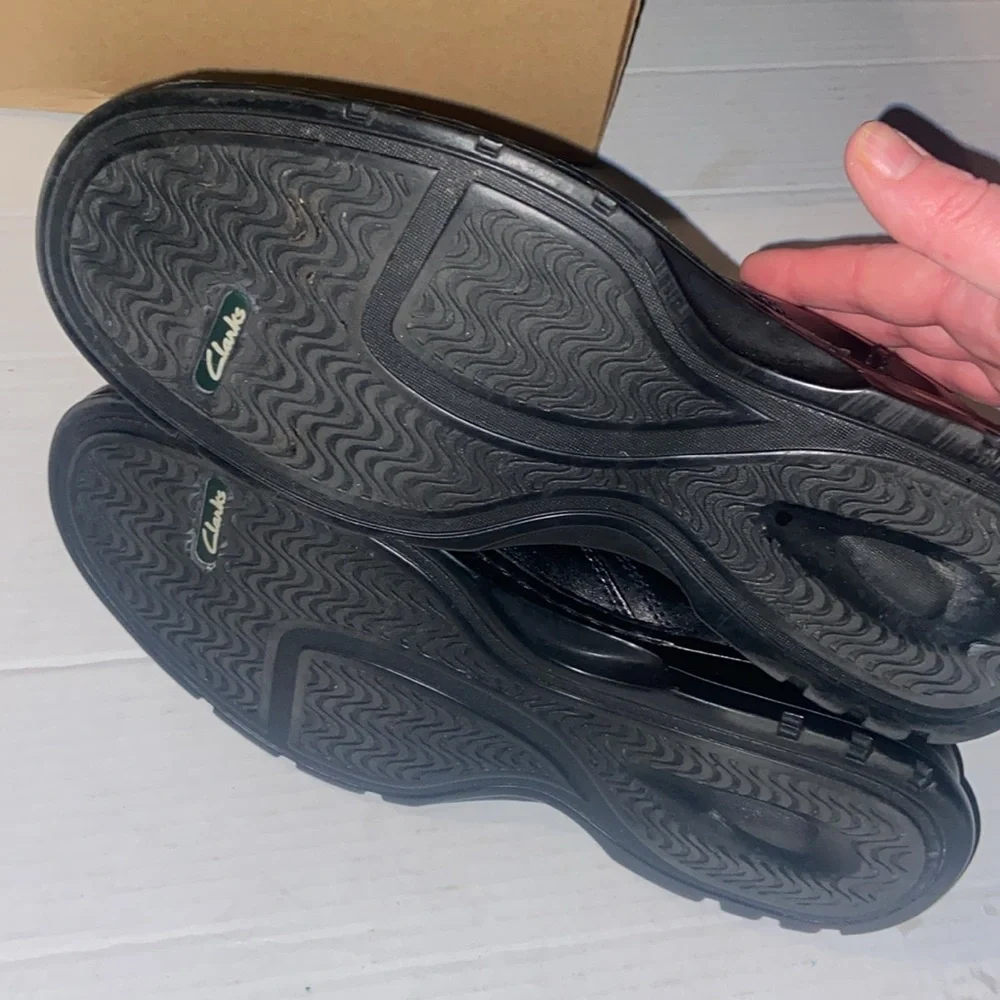 Clarks Escalate black slip on loafers size 10M with original box.